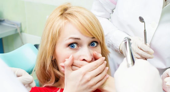 a picture of a girl who's afraid of dental work