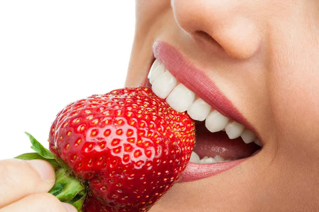 photo of a girl with a smile after aesthetic dental treatment in Bagita dentistry