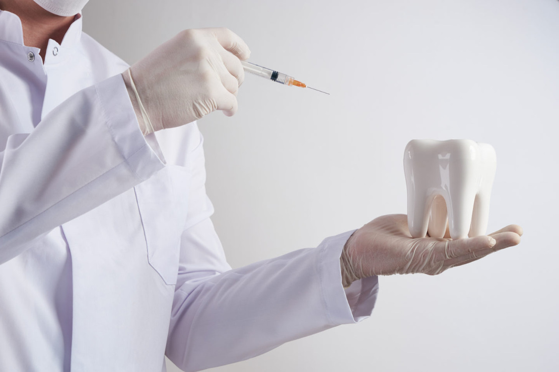 photo of a dentist who performs dental treatment in dentistry in Cherkassy