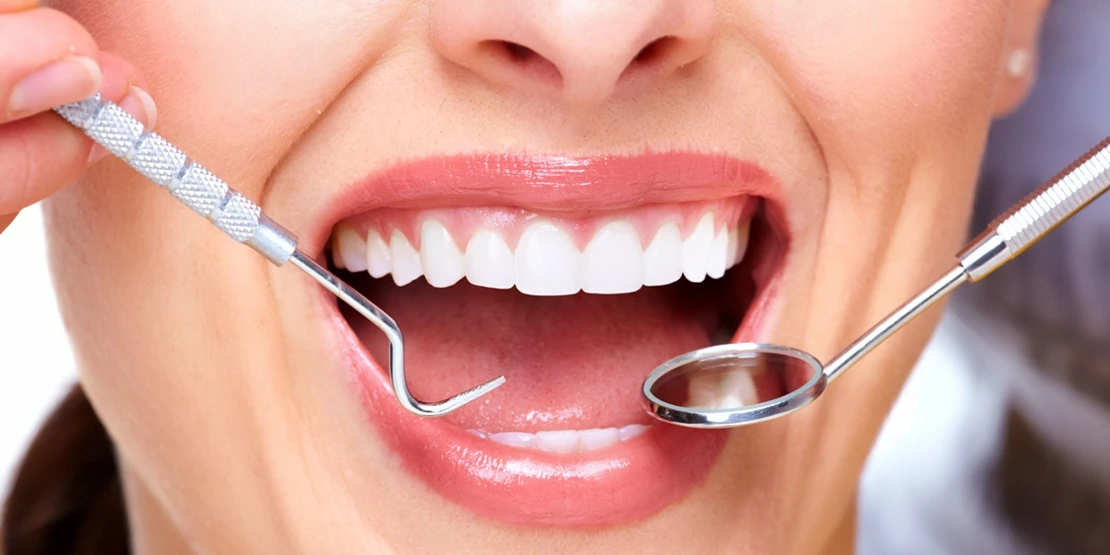 photo of teeth and dental instruments for periodontitis treatment