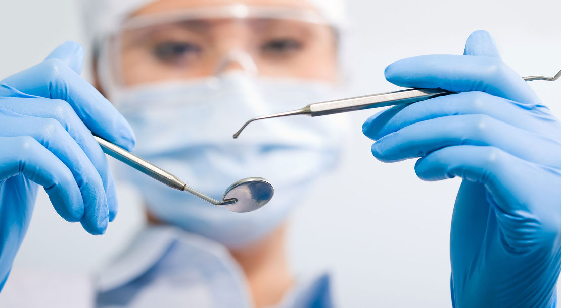 photo of a dental instrument in the hands of a dentist at the Bagita Clinic